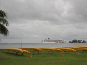 Canoes and cruise ship